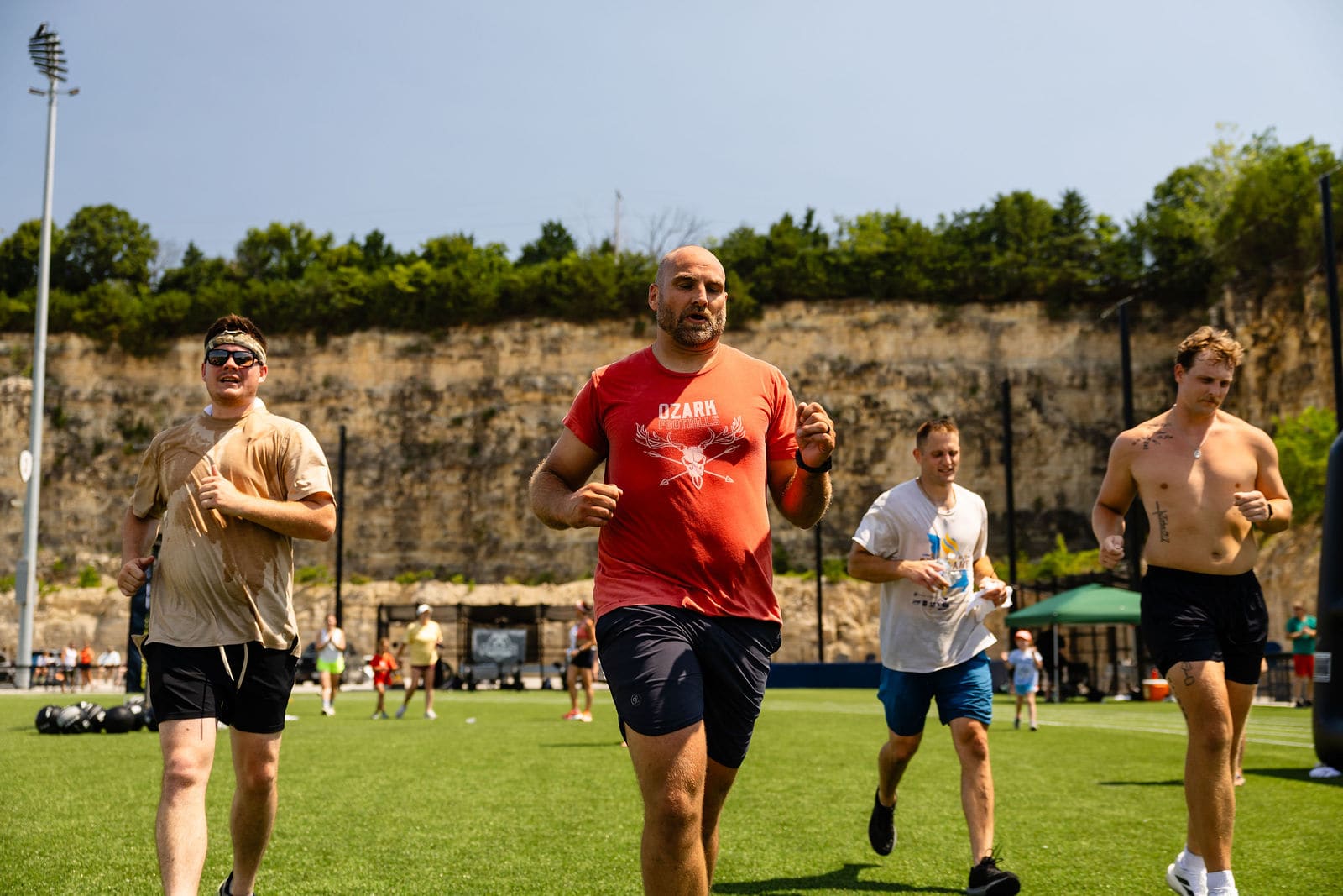 A smiling runner mid-race